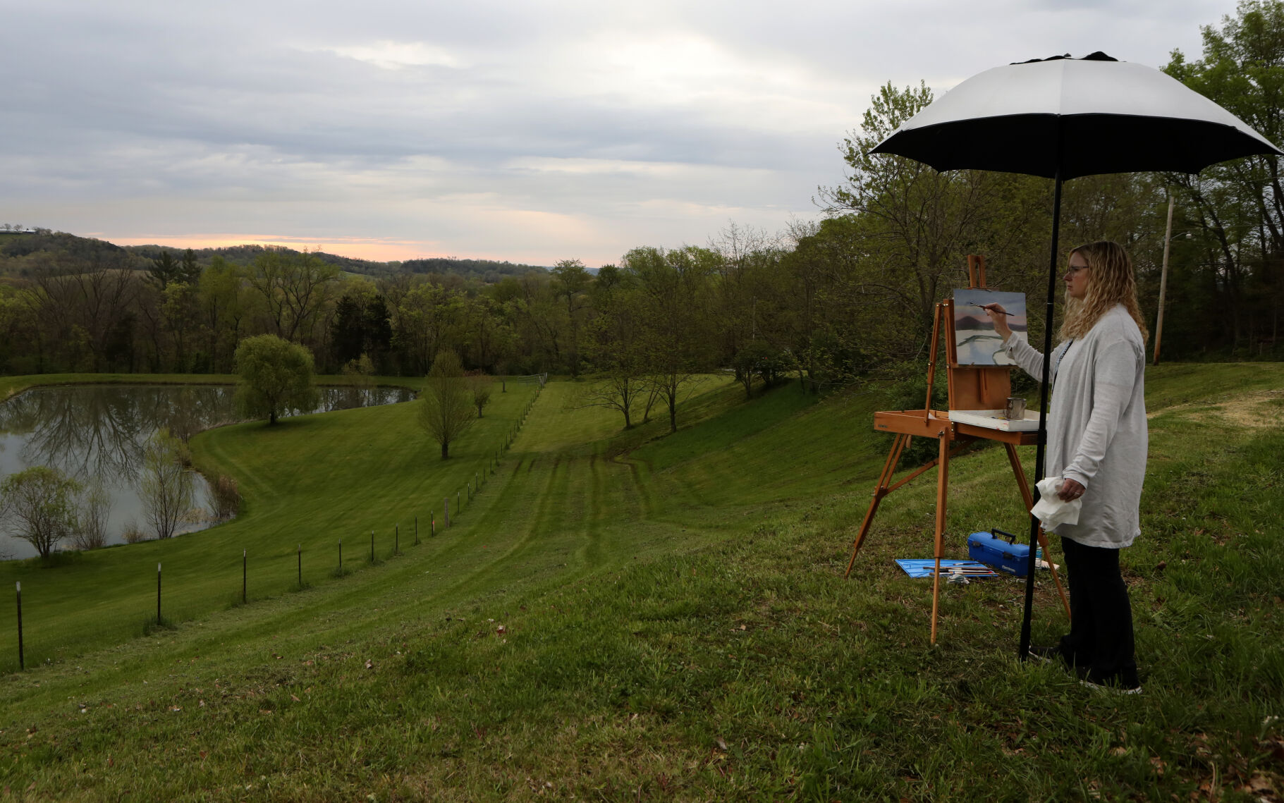 Amy Jamison looks at the sunrise